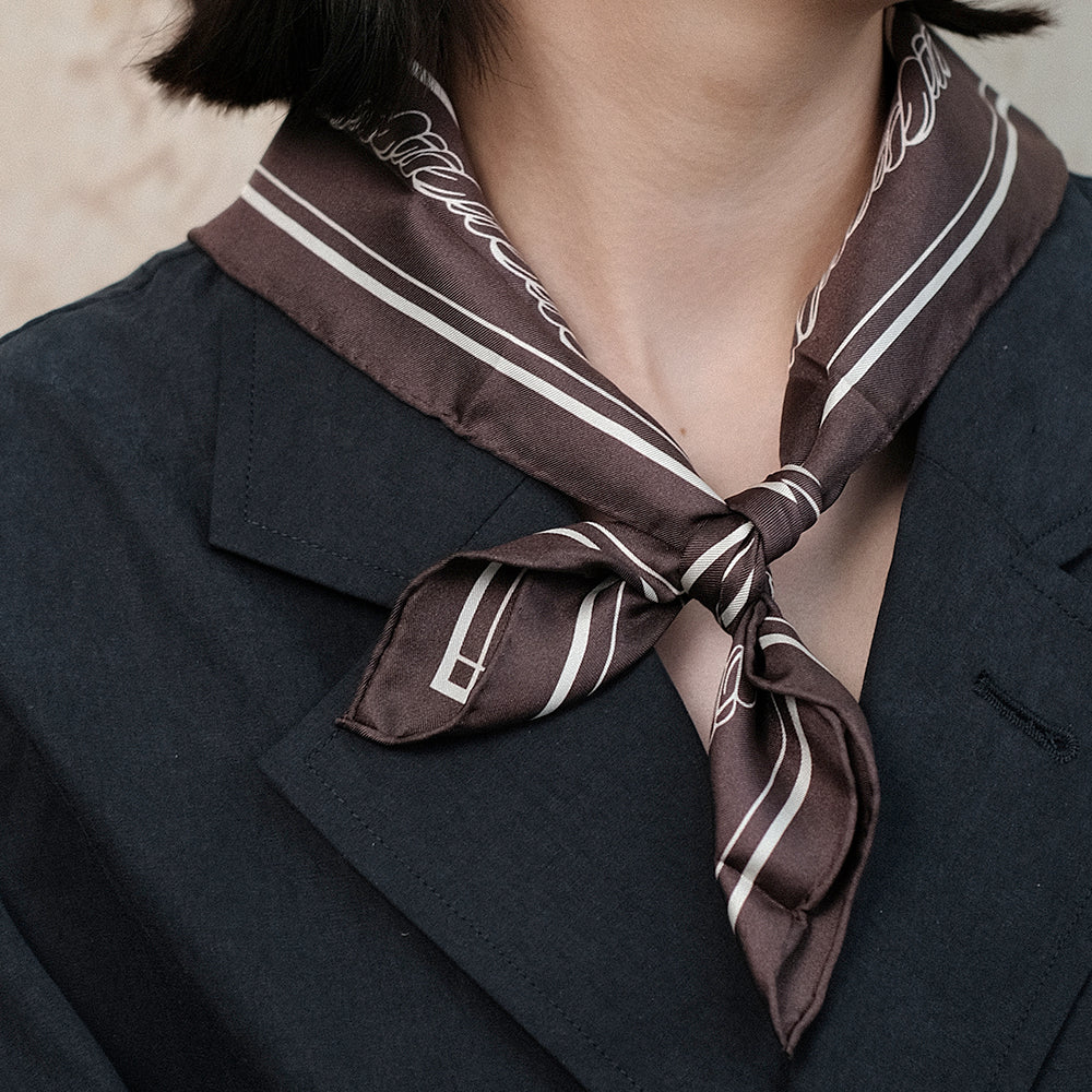 Woven and knotted mulberry silk scarf