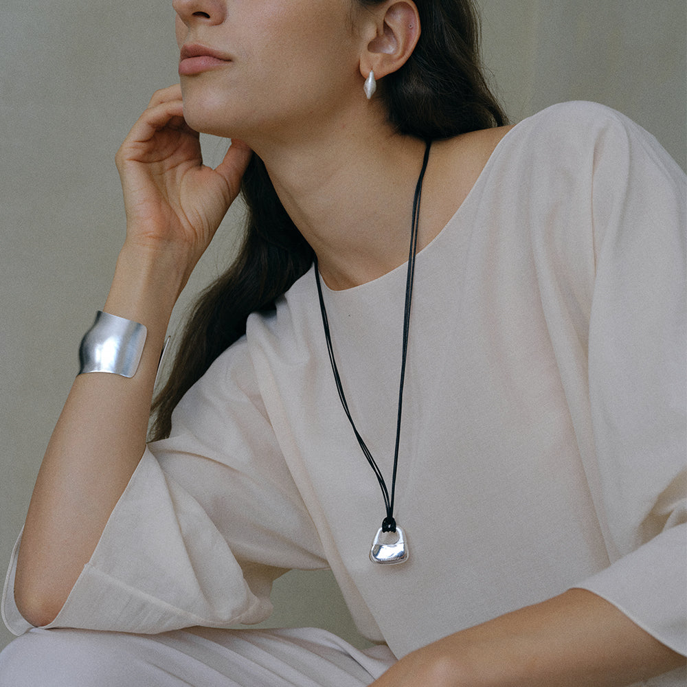 SILVER SILK EMBROIDERED LOCK POUCH NECKLACE